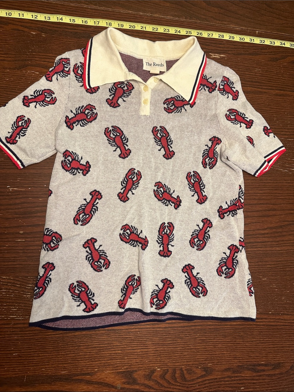 J. Crew Cream Polo with Red Lobster Motif and Navy Trim